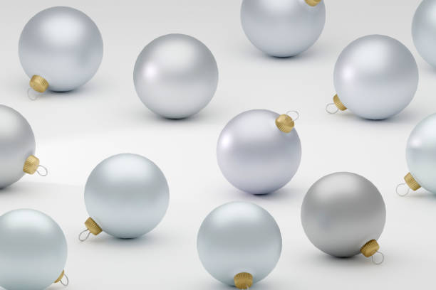 istock Multiple silver Christmas balls, shiny ornaments on light grey, 3d rendering. concept for happy new year and christmas 1698474133