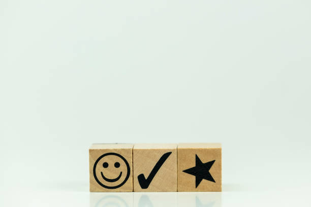 istock Positive review with smiley face and star 1698475356