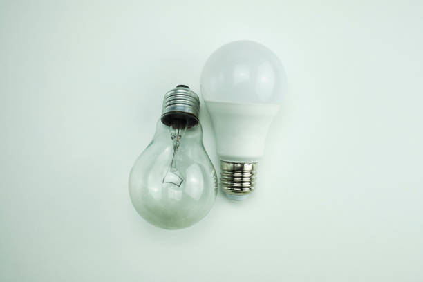 tungsten bulb next to long led bulb