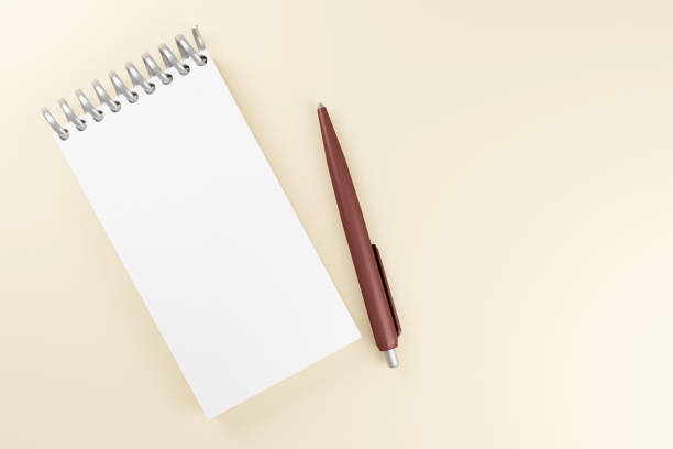 istock White notepad with brown pen. Minimal 3d illustration on soft beige background top view 1698478935