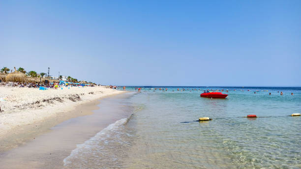 The beach of the Tunisian city of Sousse, which is distinguished by its white sand and transparent sea The beach of the Tunisian city of Sousse, which is distinguished by its white sand and transparent sea sousse tunisia stock pictures, royalty-free photos & images