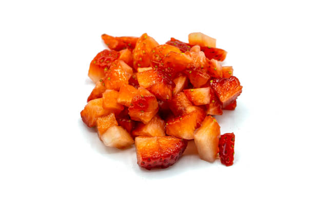istock Strawberries chopped isolated on white background 1698516524