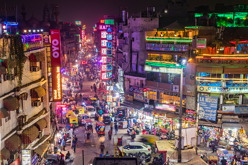 Main Bazar by night, Paharganj known for its concentration of hotels, lodges, restaurants, dhabas and a wide variety of shops catering to both domestic travellers and foreign tourists, especially backpackers and low-budget travellers.