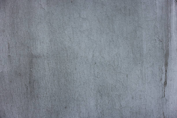 istock concrete outdoor wall with matte gray paint and smudges - full-frame background and flat texture 1698563773
