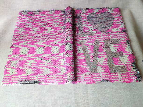 A pink book was placed on the table