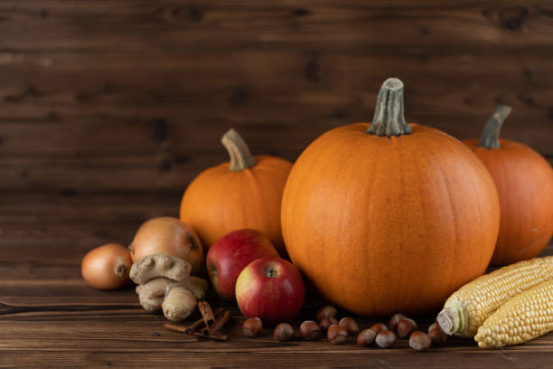 istock Autumn harvest still life with pumpkins 1698579530