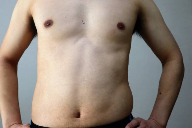 istock Japanese man with belly fat 1698602036