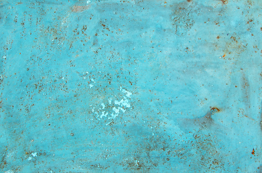 Blue rusty metal texture background close up.