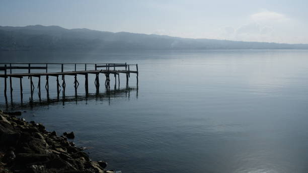 Small dock at the sea in the morning, viewed from side