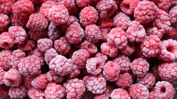 istock natural texture of red frozen raspberries 1698650074