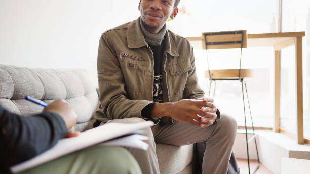 istock Young man speaking with a businesswoman during an interview 1698669259