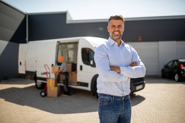 istock Portrait of manager at work in front of a van 1698678582