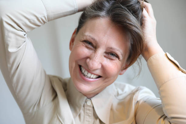 istock Smiling business woman working in office 1698683557