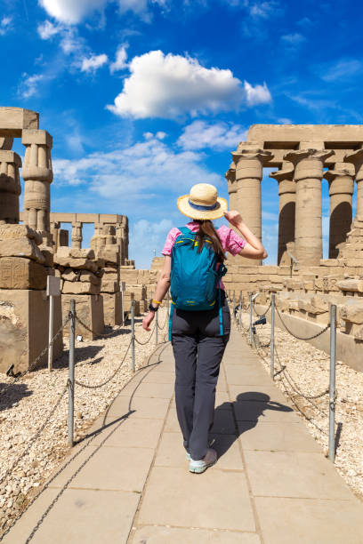 istock Woman at Luxor Temple in Egypt 1698684149
