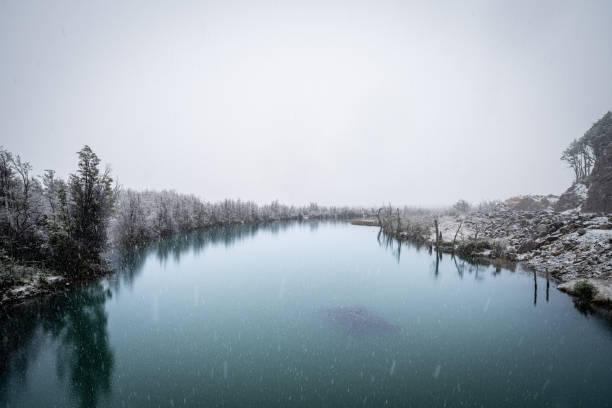 Ibanez river flowing through snowy forests in the chilean Patagonia
