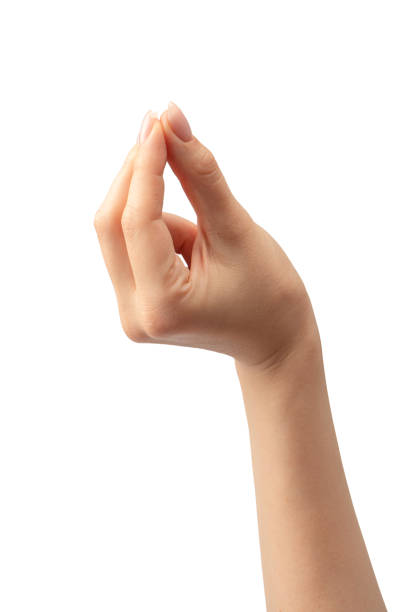 istock Hand of a woman holds some tiny or thin object. 1698705851