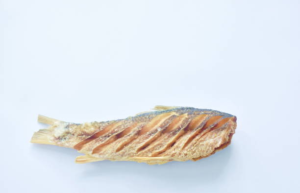 istock deep fried salty mullet fish arranging on white background 1698722183