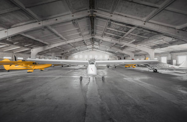 istock Small airplanes in storage at small regional aerodrome. 1698722791