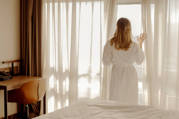istock Greets New Day With Warm Sunlight Flare in the Window 1698735287
