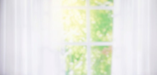 blurred bstract background of curtain and big window and green garden bokeh.for decoration design