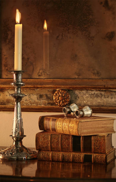 istock Burning candle on silver candelabra. 1698770748