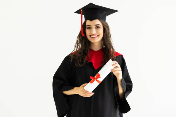 istock Young woman graduating student with diploma on light background 1698771001