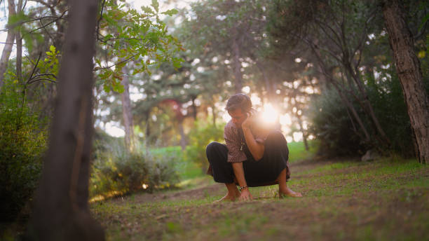 istock Man dancing while listening to music in public park 1698773167