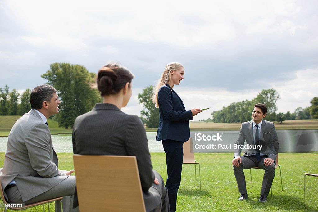 Business people having meeting outdoors  20-24 Years Stock Photo