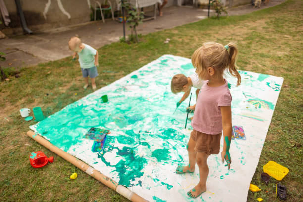 istock Children drawing in nature 1698792415