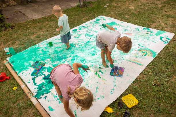 istock Family of three having fun in the backyard 1698792434