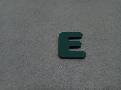 Children's educational toy in the form of the letter E