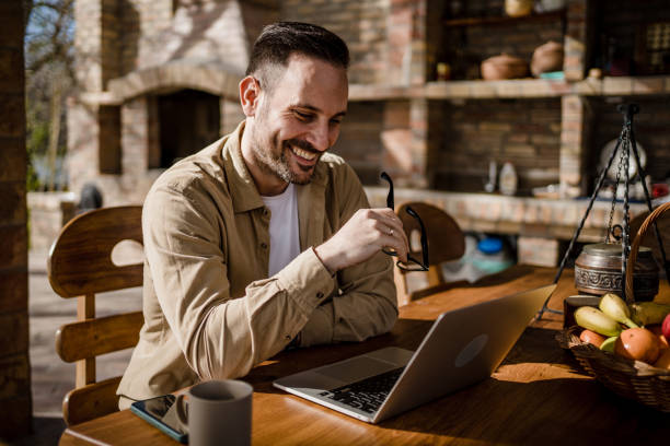 istock A middle-aged Caucasian man works on a laptop 1698825794