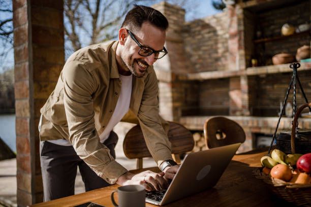 istock A middle-aged Caucasian man works on a laptop 1698825880