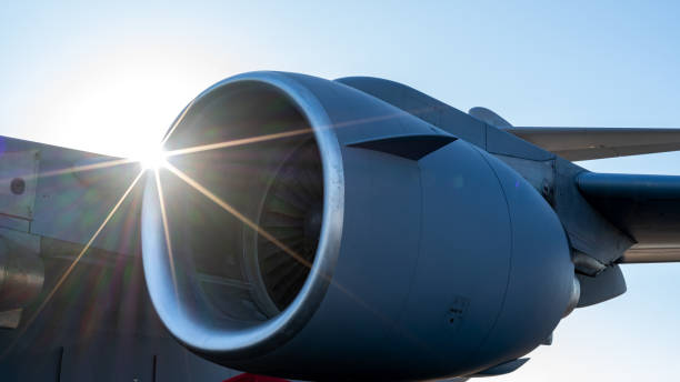 istock Military Jet Engine closeup with sun star 1698837696