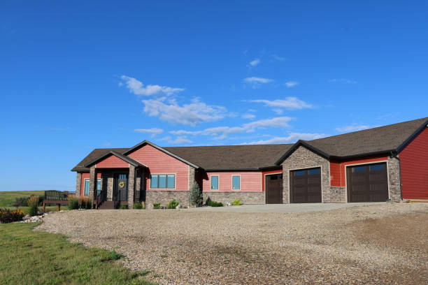 istock Rural Single Family Home Exterior with 3 stall garage 1698842183