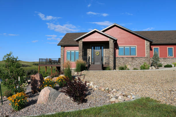 istock Rural Single Family Home Exterior with brick entry 1698842189