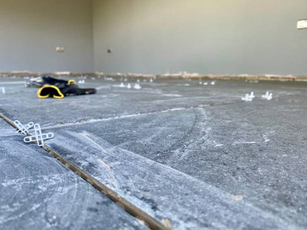 istock New Porcelain Stone Floor Tile Being Laid 1698880436