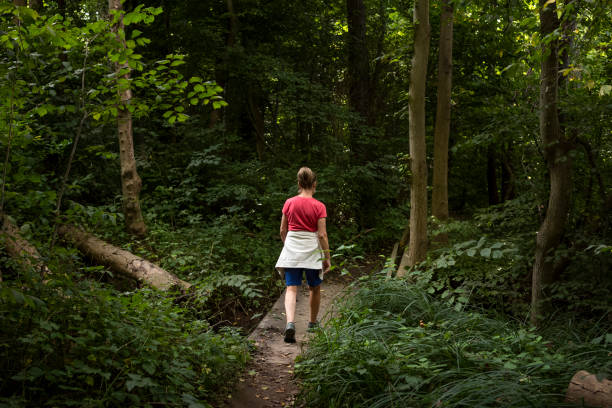 istock Senior Woman Active Walking Outdoor Forest 1698902226