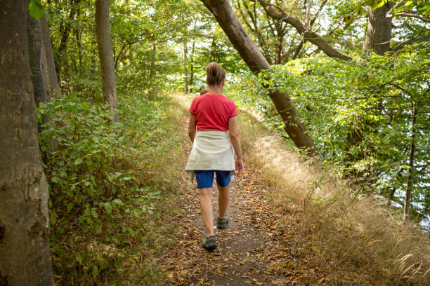 istock Senior Woman Active Walking Outdoor Forest 1698902265
