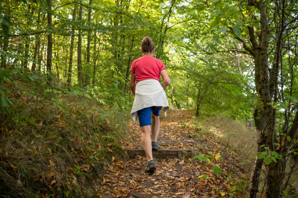 Senior Woman Active Walking Outdoor Forest