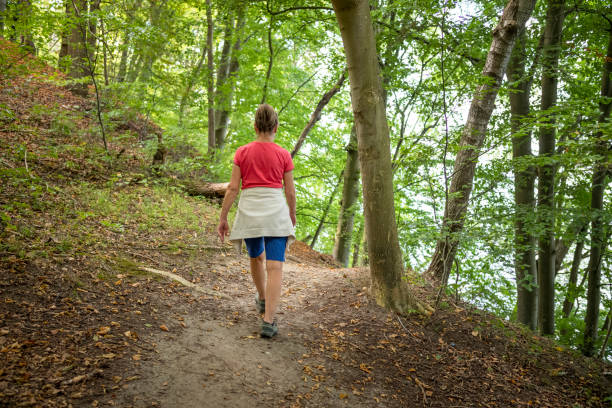 istock Senior Woman Active Walking Outdoor Forest 1698909576