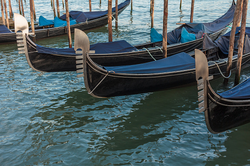Gondolas on a canal in Venice in Italy