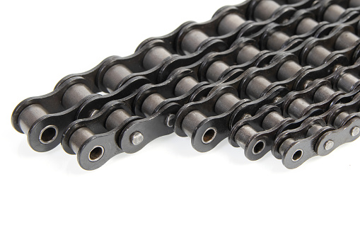 Industrial driving roller chain on white background
