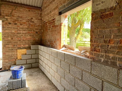 Home Construction New Window Opening Cut into Brickwork and Steel Support