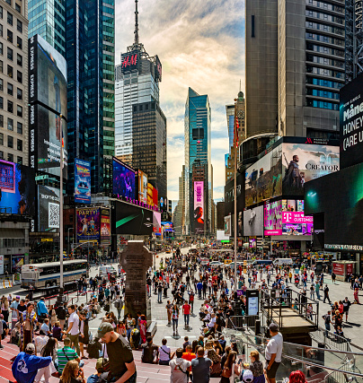 Times Square, Manhattan, New York, USA - September 15, 2023. Panoramic view of the buildings and electronic billboards in Times Square New York city with crowds of people