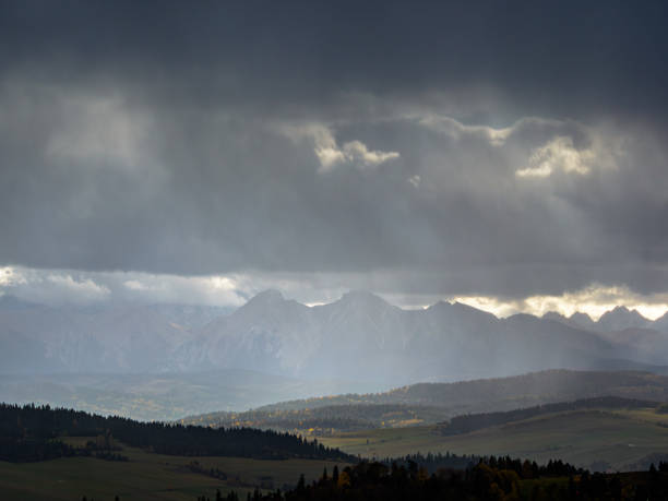 istock Autumn landscape with a view of the mountains. 1698975475