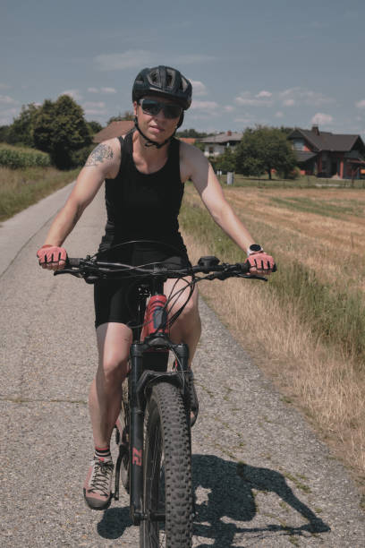 istock A woman riding a bike 1698975479
