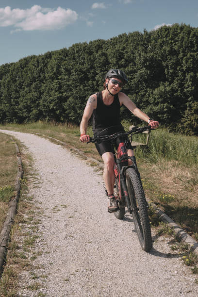 istock A woman riding a bike 1698980869