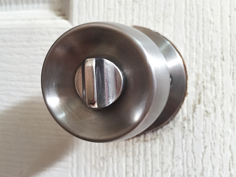 Doorknob, close-up of a circle shape metallic doorknob and lock