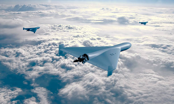 istock Group of kamkazza combat drones on the background of sky and clouds, top view, 3d rendering. Concept: war in Ukraine, drone attack. 1699011558